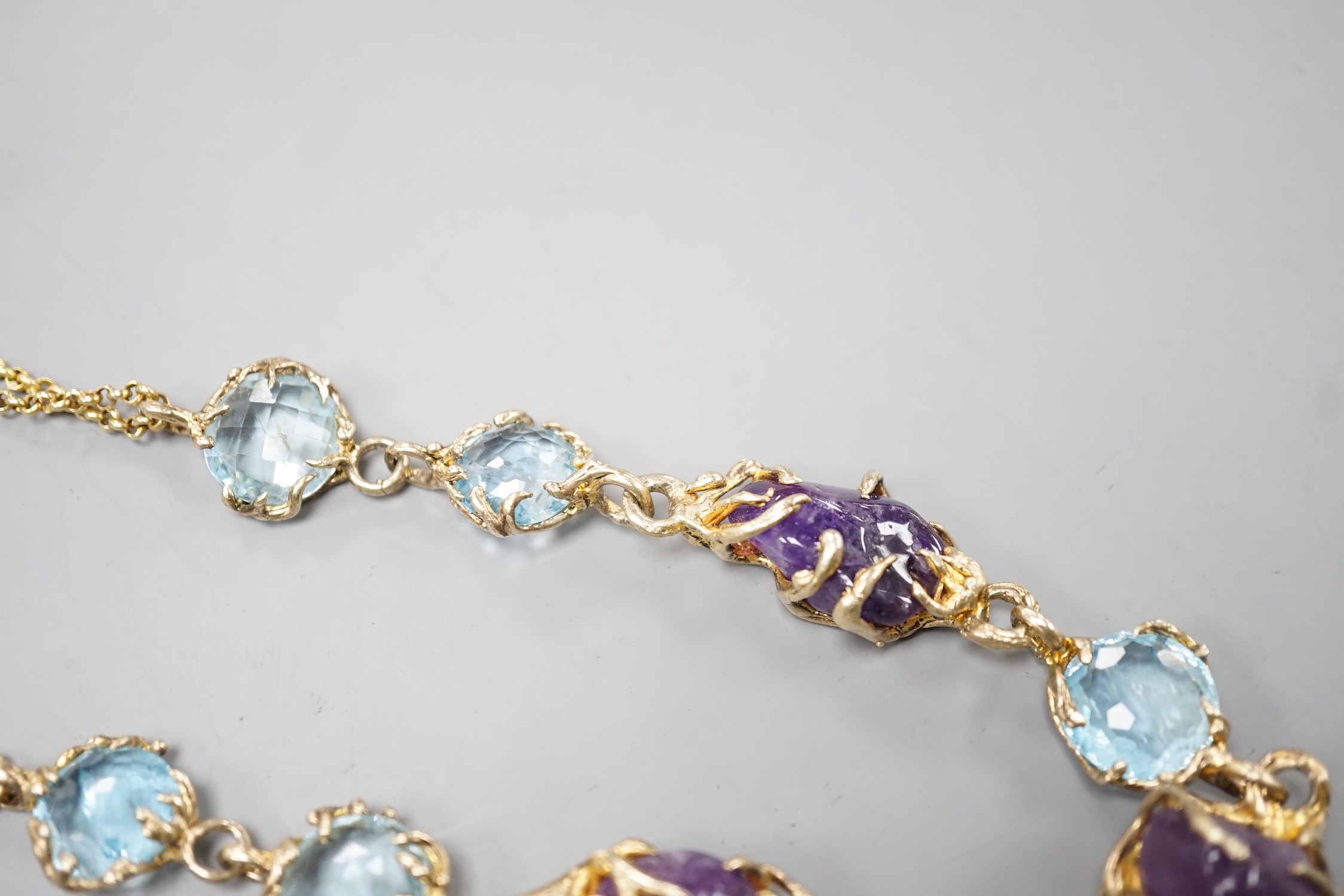 A gilt 925 amethyst pebble and gem set necklace, 42cm.